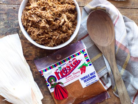 bowl full of seasoned shredded pork prepared for making tamales