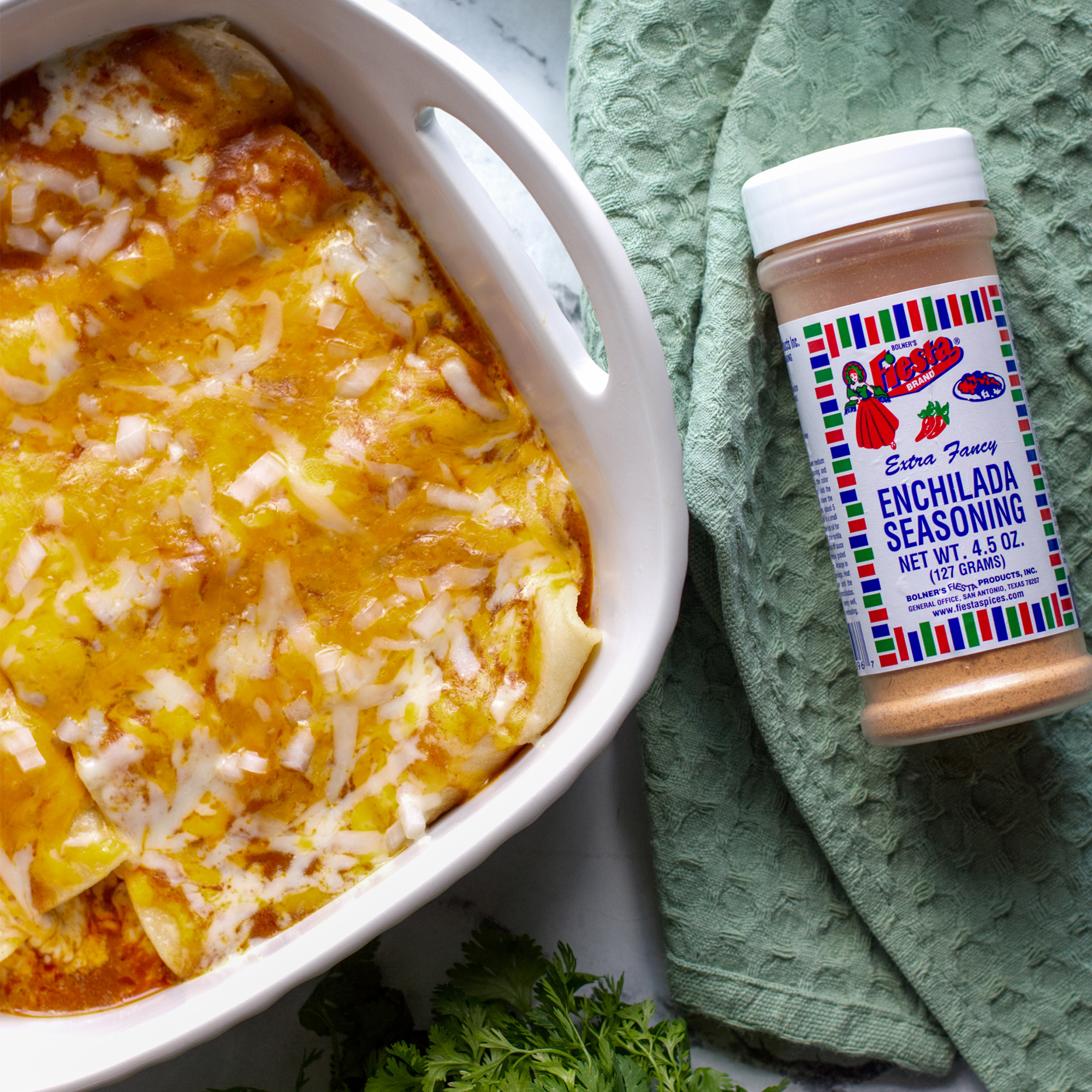 Freshly prepared Enchiladas created with Bolner's Fiesta Brand Enchilada Seasoning